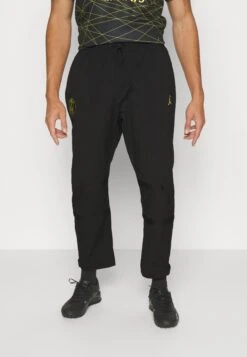 Nike Performance JORDAN PARIS ST GERMAIN WOVEN PANT - Spodnie Materiałowe - Black/tour Yellow